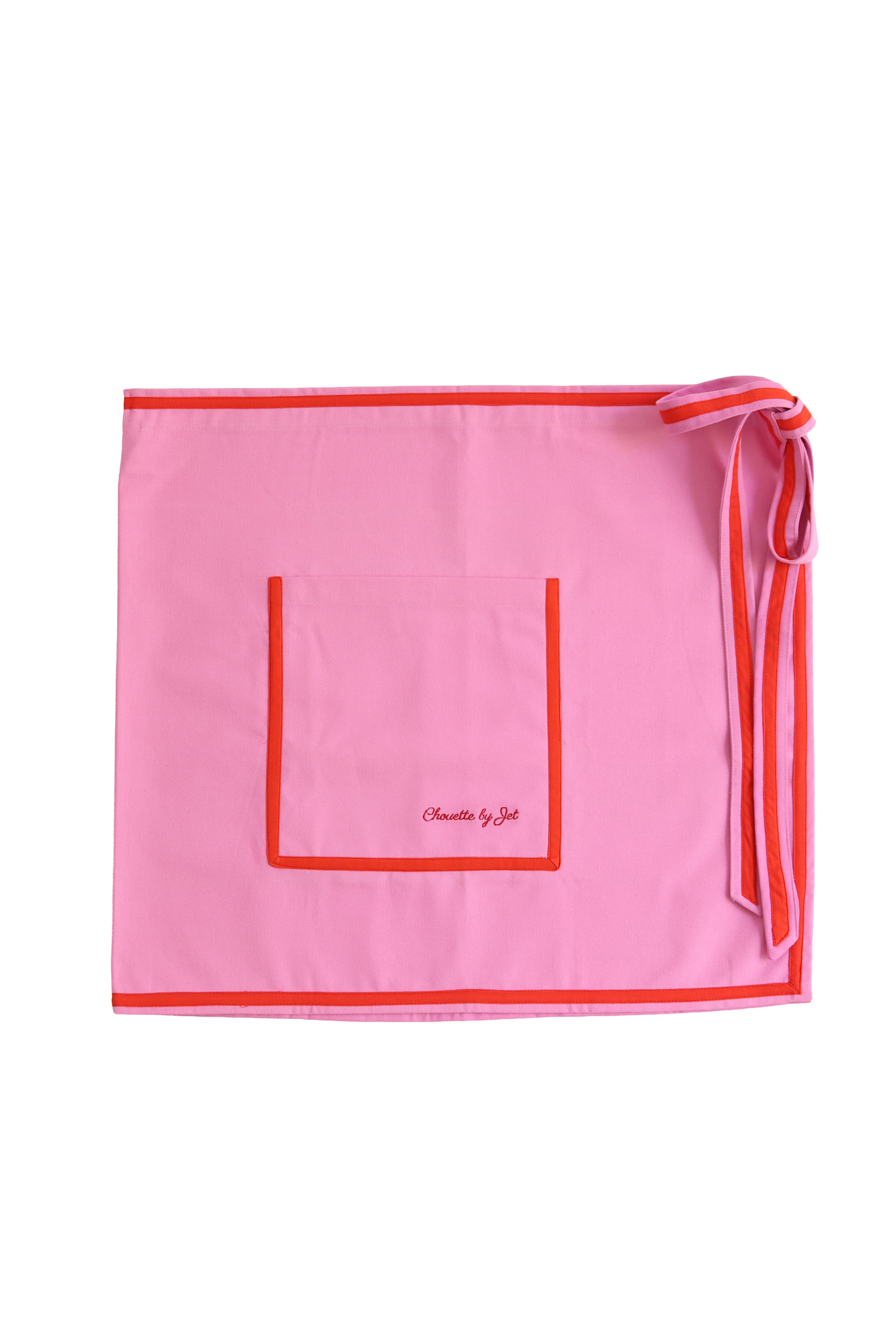 Bon bon, ofterwijl snoepje in het frans. Daar moet ik meteen aan denken. Ik vind de kleurencombinatie rood en roze helemaal te gek. Het schort heeft twee zakken voor een kurkentrekker, gereedschap, papierwerk of ander pleuraria. Zwiep ‘m om je heup of je taille et ça marge!
